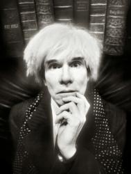 David LaChapelle, the post-modern pop photographer, was given his first job at Interview Magazine by Andy Warhol. For this portrait LaChapelle placed Warhol in front of a row of holy bibles, forshadowing the deity Warhol would become in the art world after his untimely death.